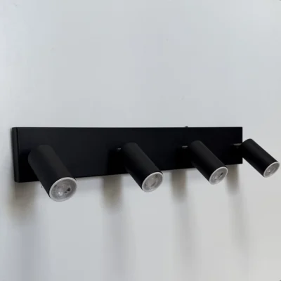 Base: 100x630 mm; Cabezales: 4x100 mm; Movimiento niquelado; Zócalo: GZ10x4; Material: Chapa al carbono; Colocación: Pared/Techo.